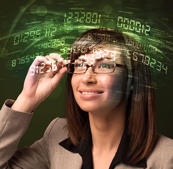 Business woman looking at high tech number calculations